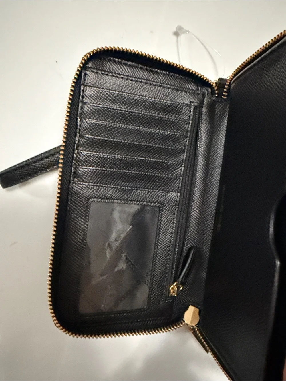 Michael Kors Black Wristlet with Gold Stud Pattern